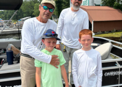 John Sr., John Jr. and his sons, Newboro Lake, Canada